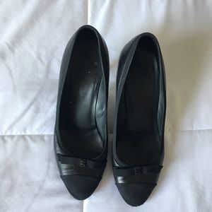 Chanel black pumps with cute bow